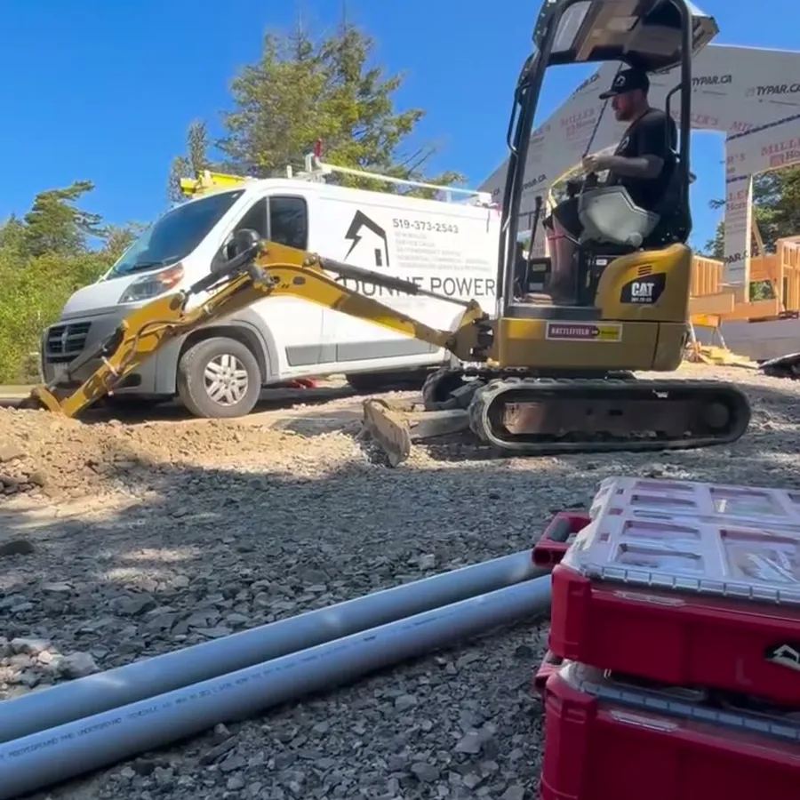 Sauble Beach: 60 metre trench, in and out in one day, step 1: Excavator and conduit on site