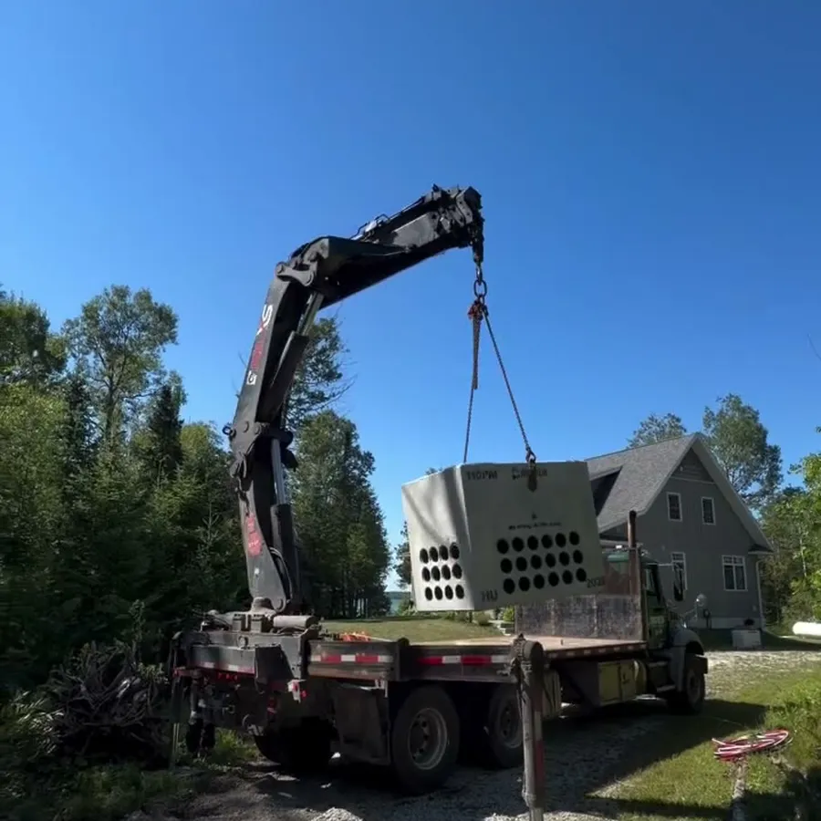 Single phase pad-mount transformer and central meter, step 3: Precast transformer base craned into place
